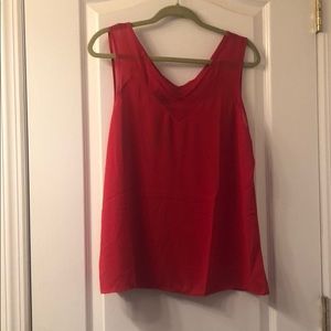 Red sleeveless blouse